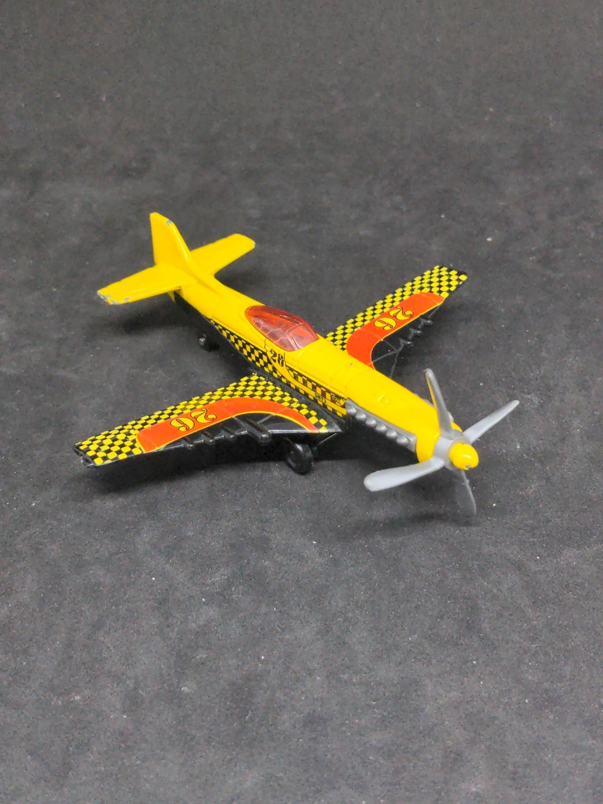 2007 Matchbox Stunt Plane Yellow Orange Black Silver