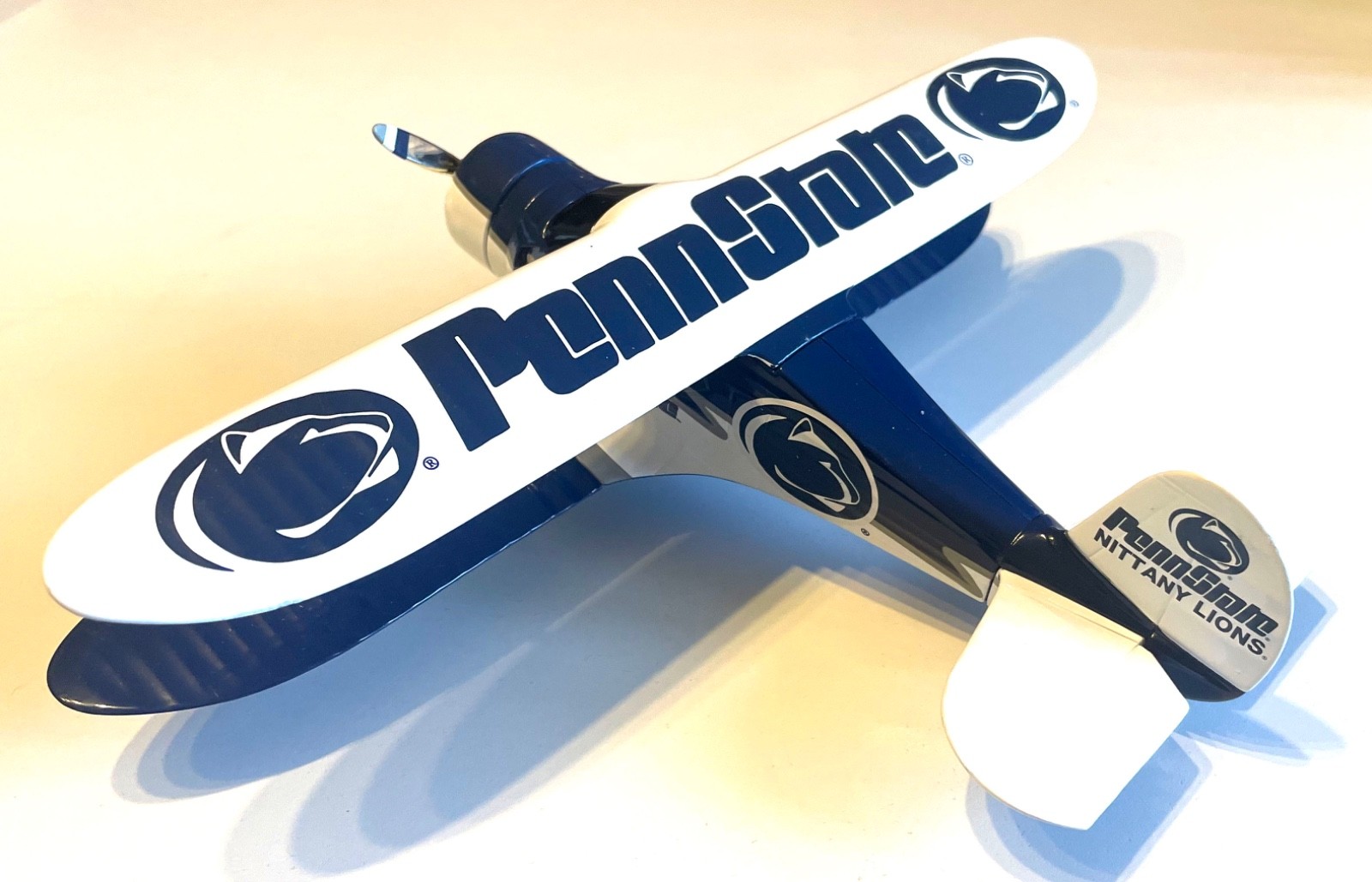 PENN STATE BEECHCRAFT D17 STAGGERWING DIE CAST METAL AIRPLANE BANK