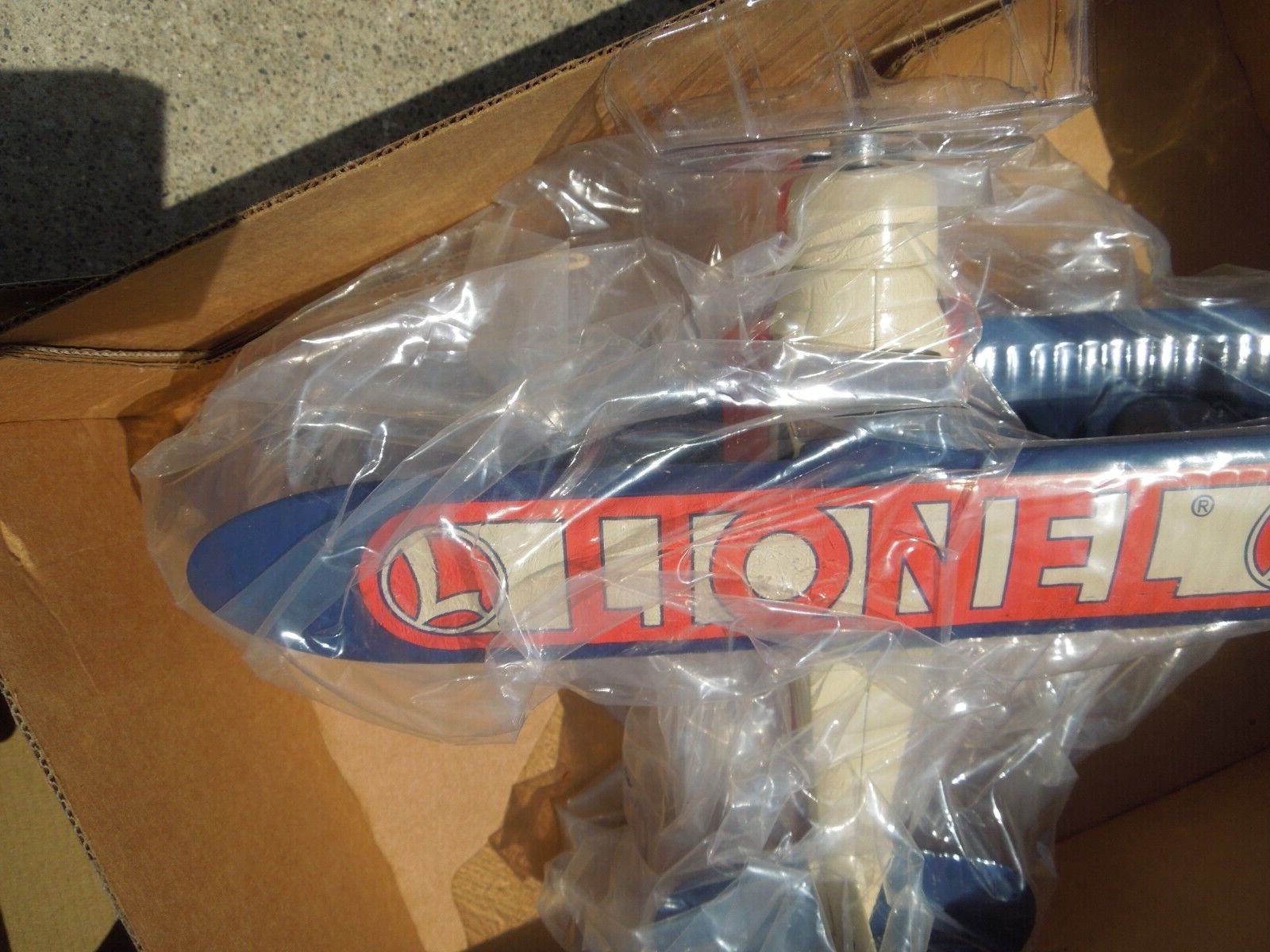NOS LIONEL EASTWOOD AUTOMOBILLA DIE CAST BEECHCRAFT BIPLANE COIN BANK 337500