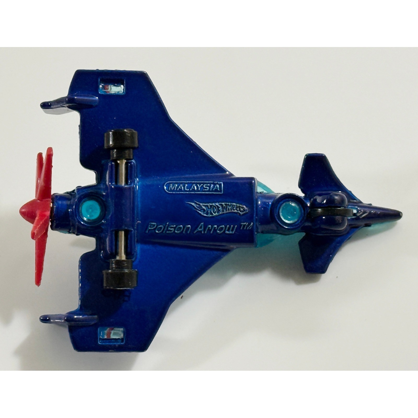 Hot Wheels Poison Arrow Stunt Plane Blue Teal Translucent Die-Cast Toy