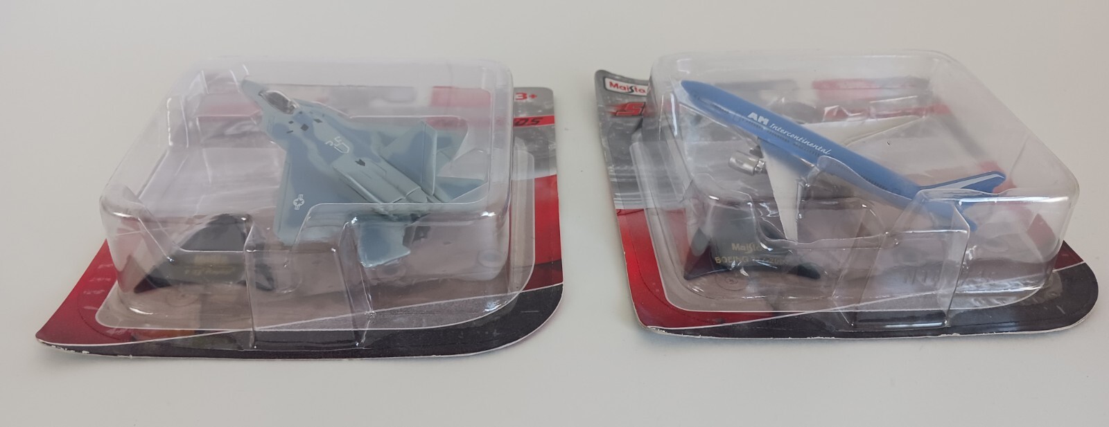 2, 2012 Maisto Tail Winds Series I Die-cast F-22, Boeing 777-200 Speed Gear Rare