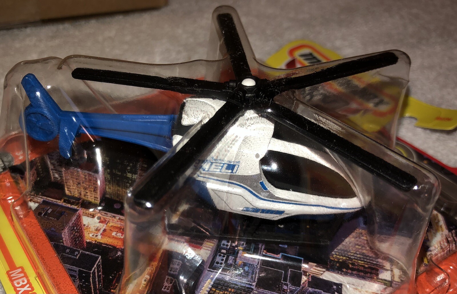 Matchbox Sky Busters #17/32 MBX EHELI BLUE/WHITE/BLACK W/ PLAYMAT 2024 RELEASE