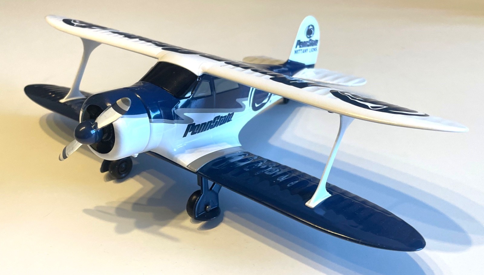 PENN STATE BEECHCRAFT D17 STAGGERWING DIE CAST METAL AIRPLANE BANK