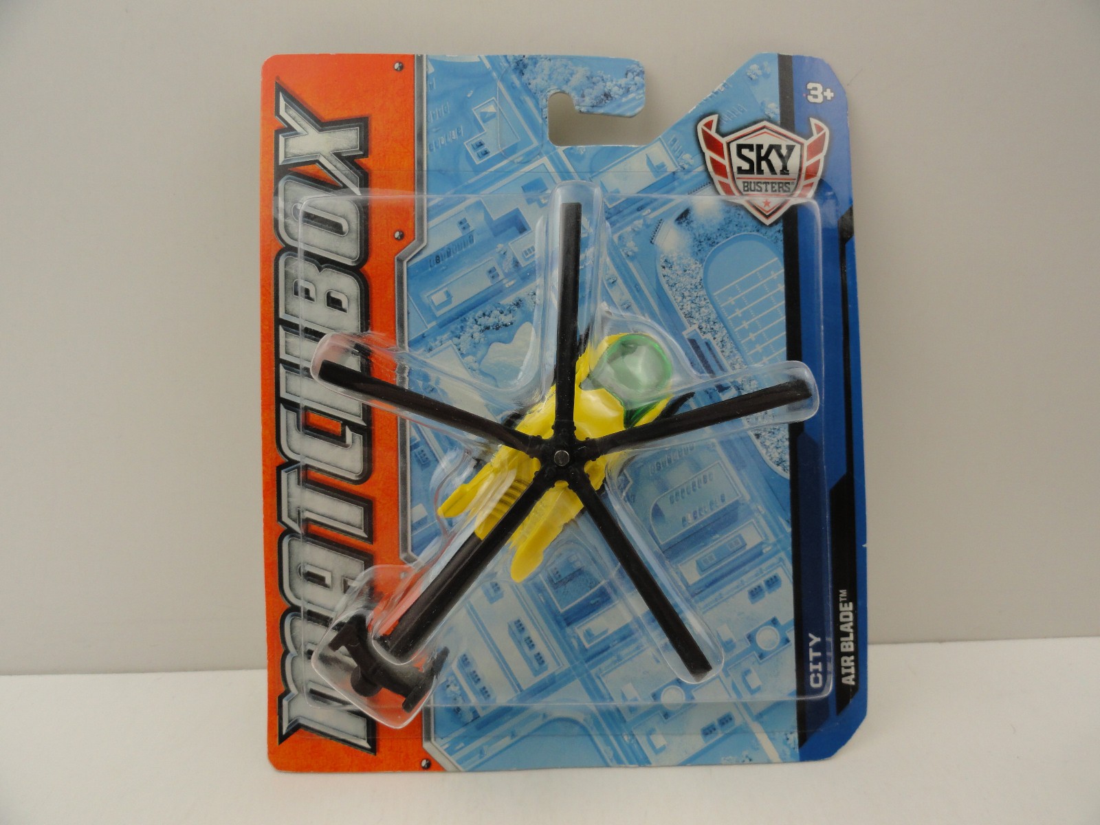 2012 Matchbox Sky Busters City Air Blade Helicopter (Yellow News 10)