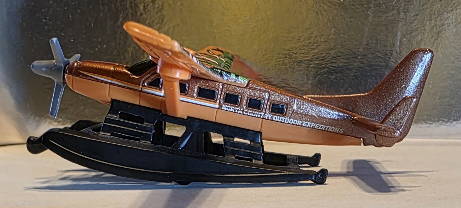 Mattel MB 1:64 2015 Cessna Caravan Seaplane North Country SB-135 Brown/Orange