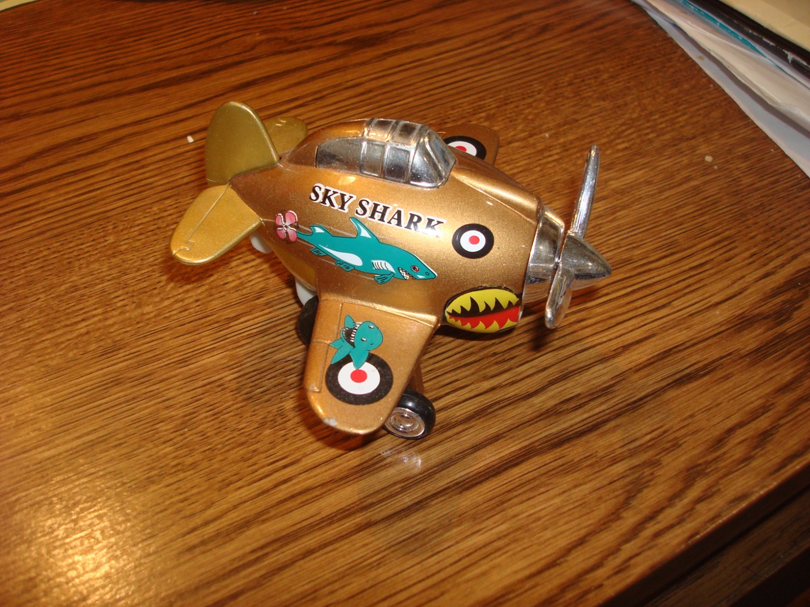 Toysmith Sky Shark Pull Back Military Airplane Gold Toy 2012 Diecast
