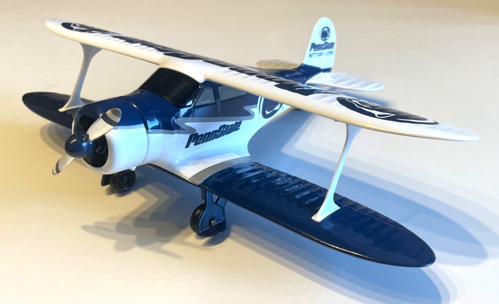 PENN STATE BEECHCRAFT D17 STAGGERWING DIE CAST METAL AIRPLANE BANK