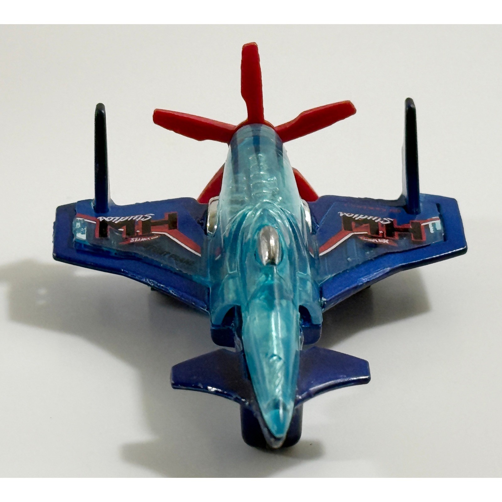 Hot Wheels Poison Arrow Stunt Plane Blue Teal Translucent Die-Cast Toy