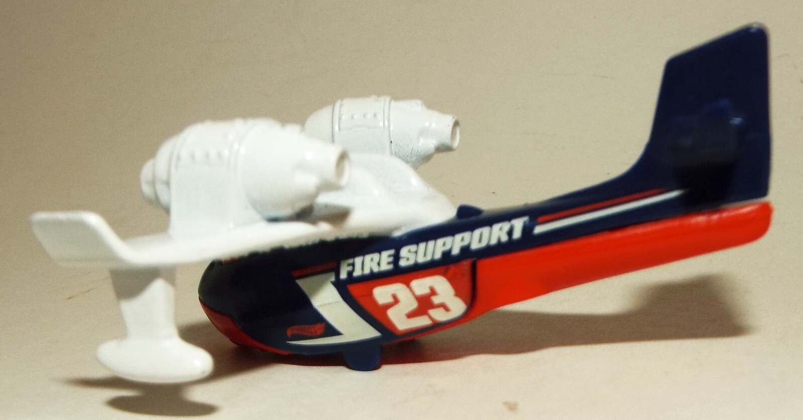 Hot Wheels Small Die Cast Water Bomber in Black & White with Red Trim