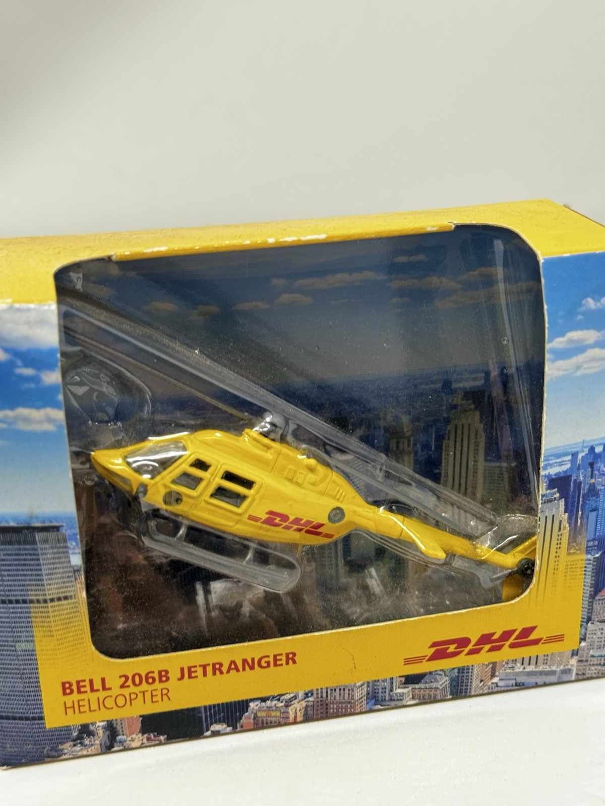 Daron: DHL Bell 206B Jetranger Helicopter Diecast Model: DHL2632 NIB