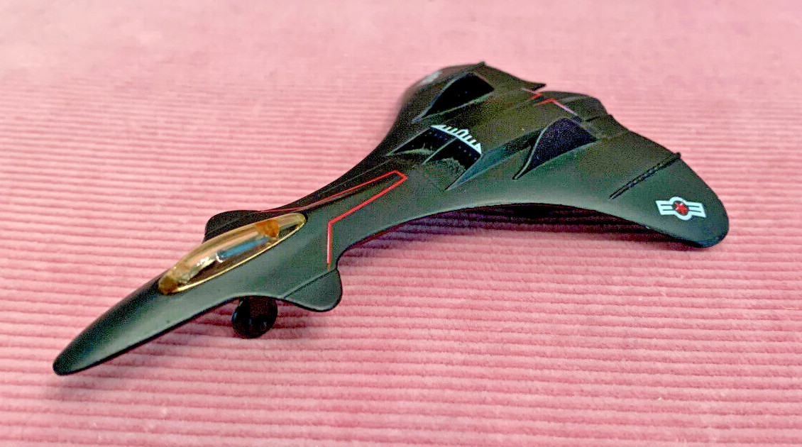 4 stealthy jet aircraft set. die cast metal. 4-5 inches. B-2, F-117, Exp, Future