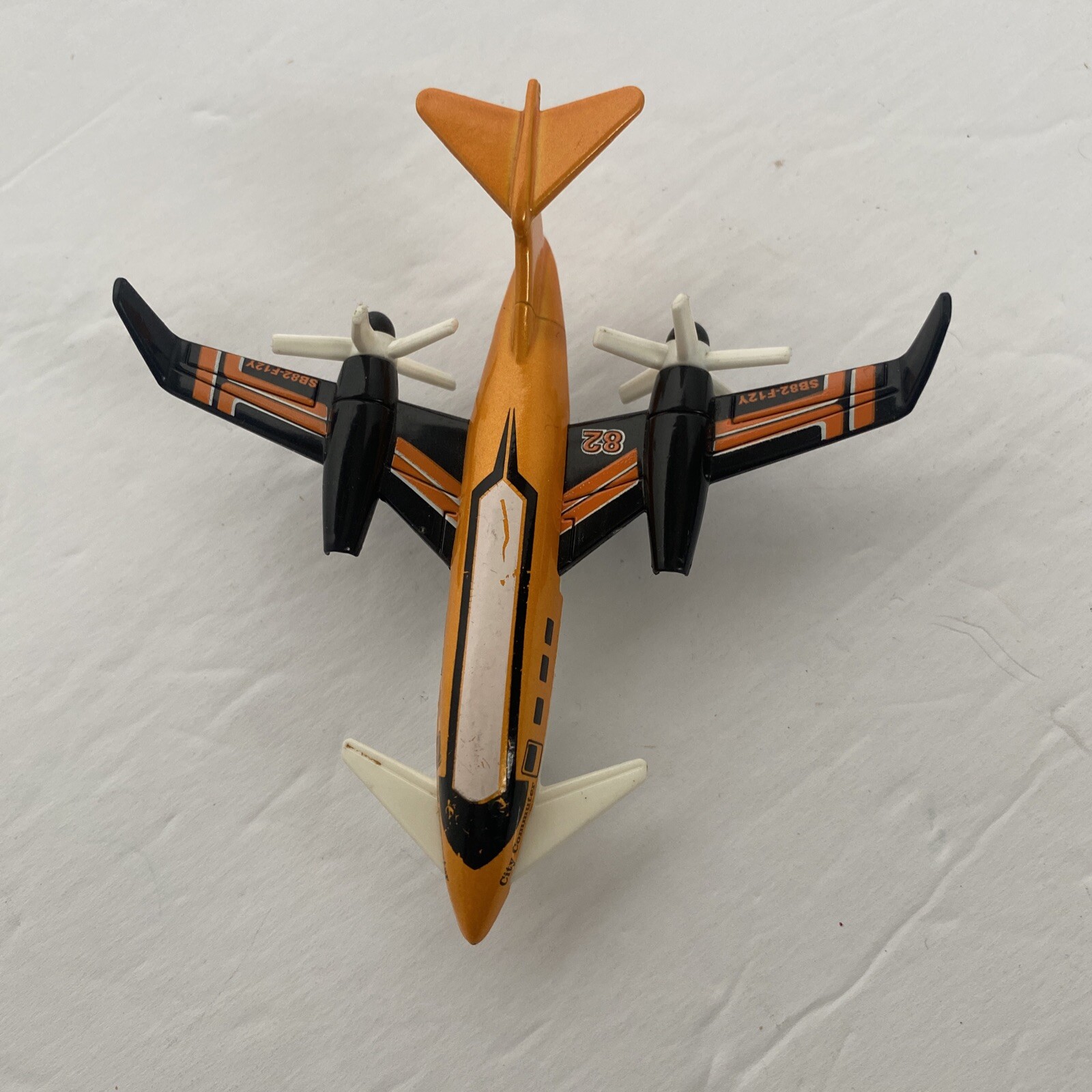 Matchbox 2009 Pusher Prop Plane SB82 City Commuter- Orange/Black/White Diecast