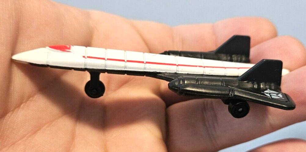 Unbranded Black Red and White Jet Fighter loose diecast plane attacked always