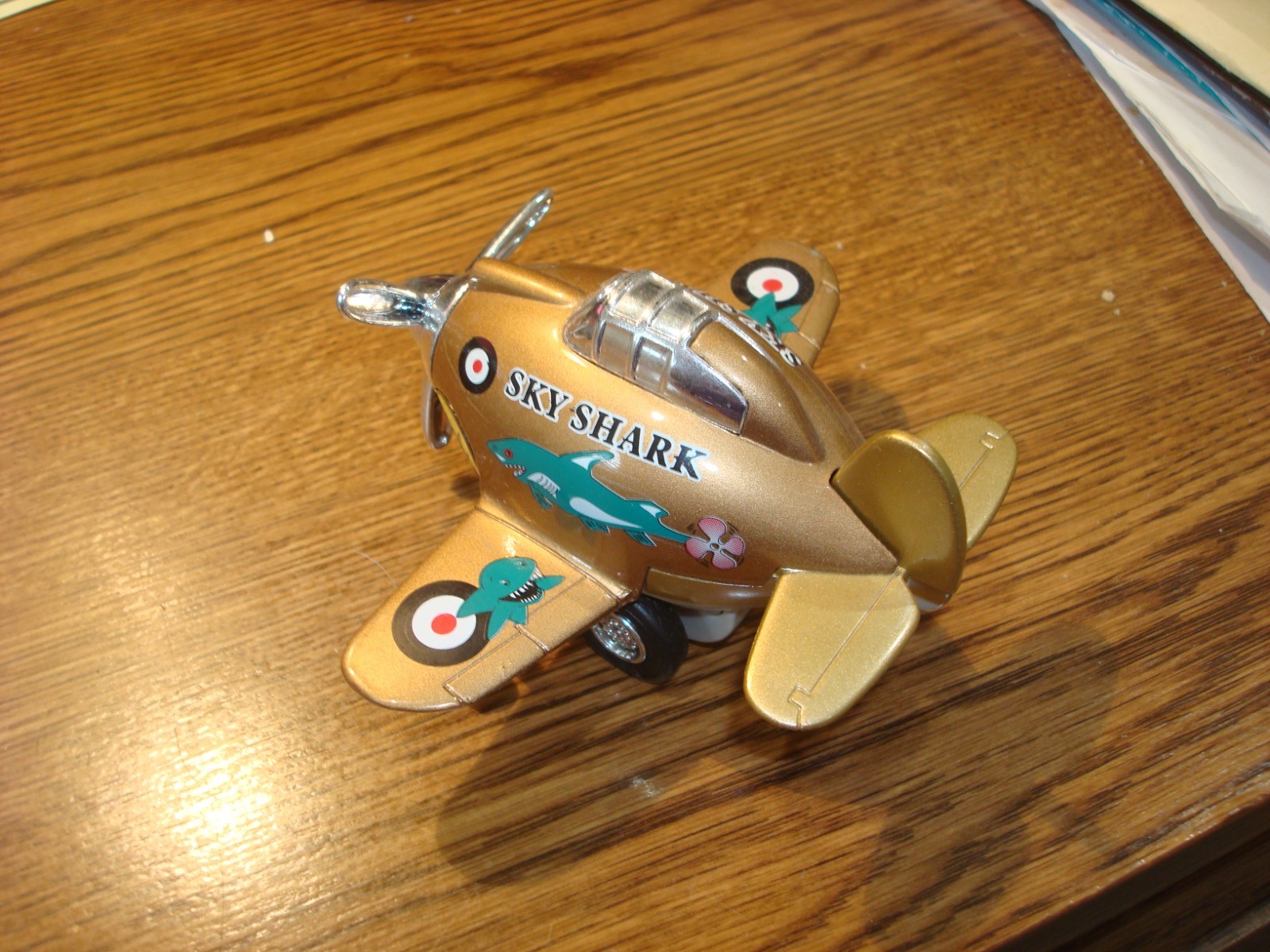 Toysmith Sky Shark Pull Back Military Airplane Gold Toy 2012 Diecast